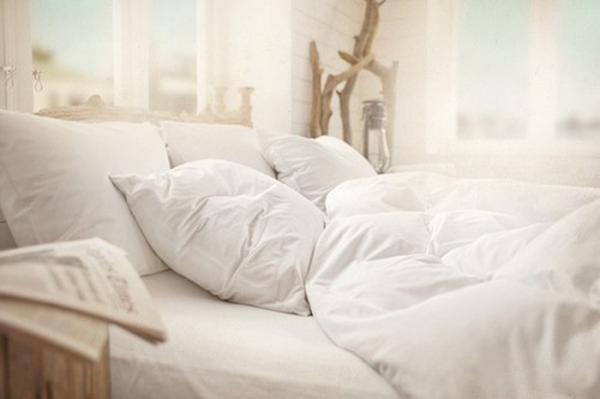 all white bed sheets and pillows