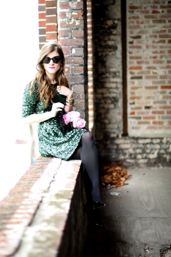 Green sequin dress black tights holiday look