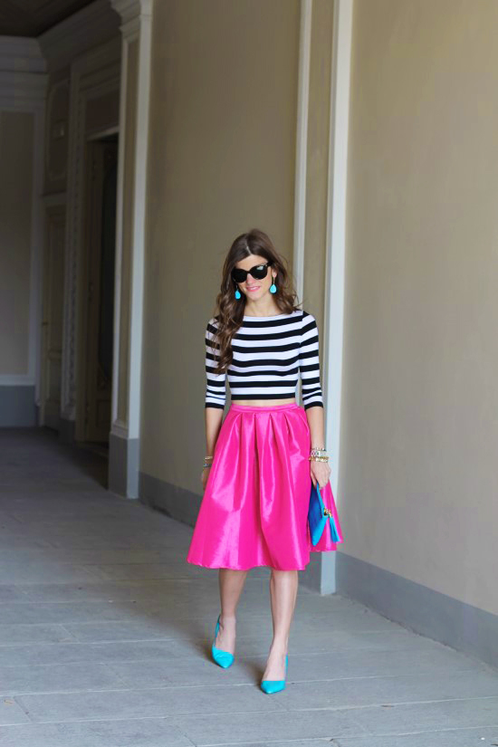 Hot pink midi skirt outfit + black and white striped crop top