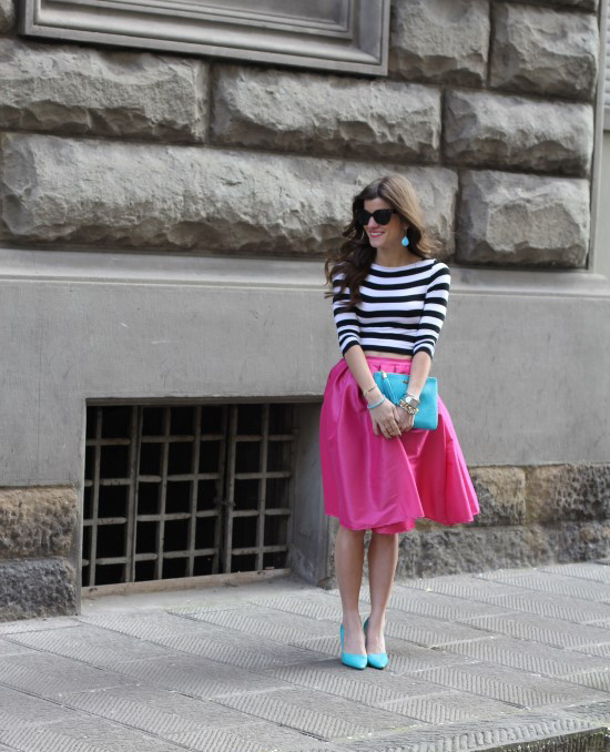 hot pink midi skirt, black and white striped crop top, turquoise accents