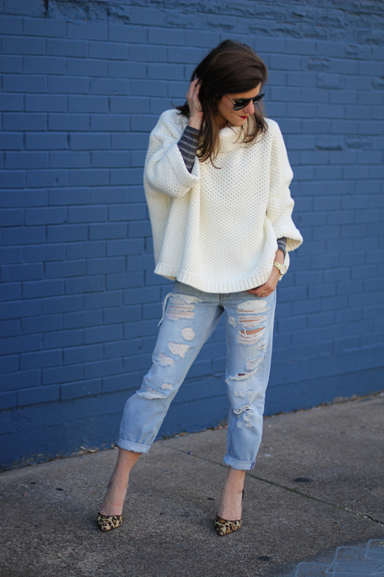 oversized slouchy sweater with distressed denim and cheetah heels