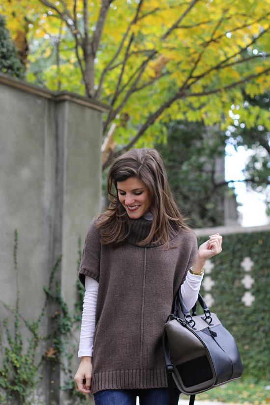 Old Navy Poncho over white turtleneck with jeans and dolce vita booties