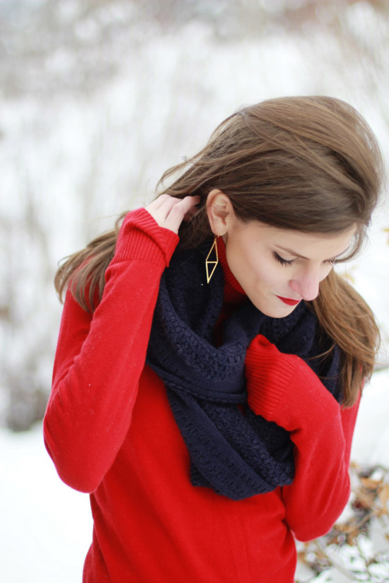 navy knit infinity scarf and red turtleneck
