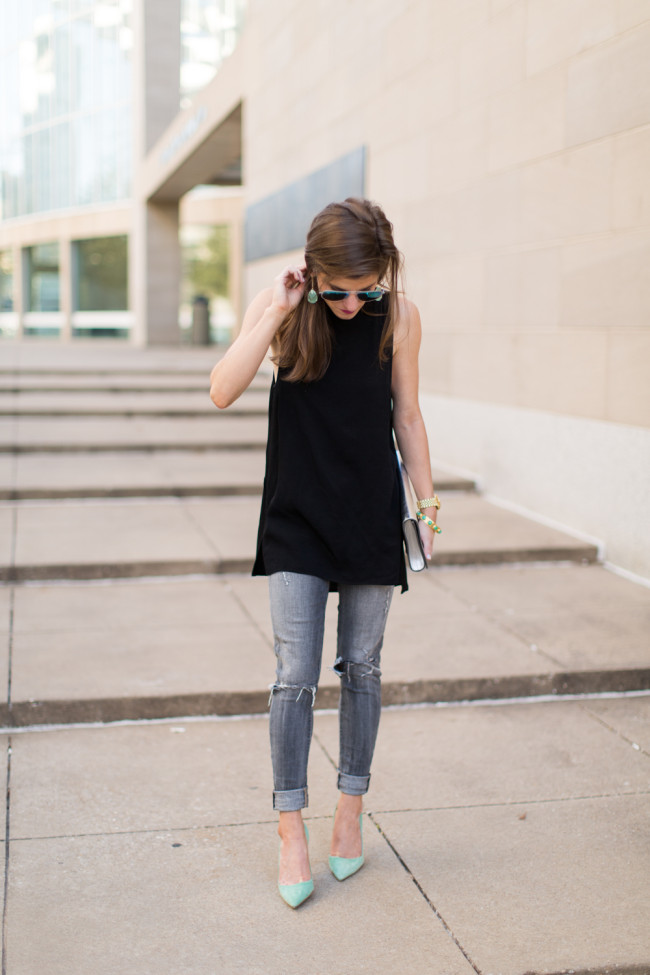grey jeans, black sleeveless tunic, green pumps, silver clutch