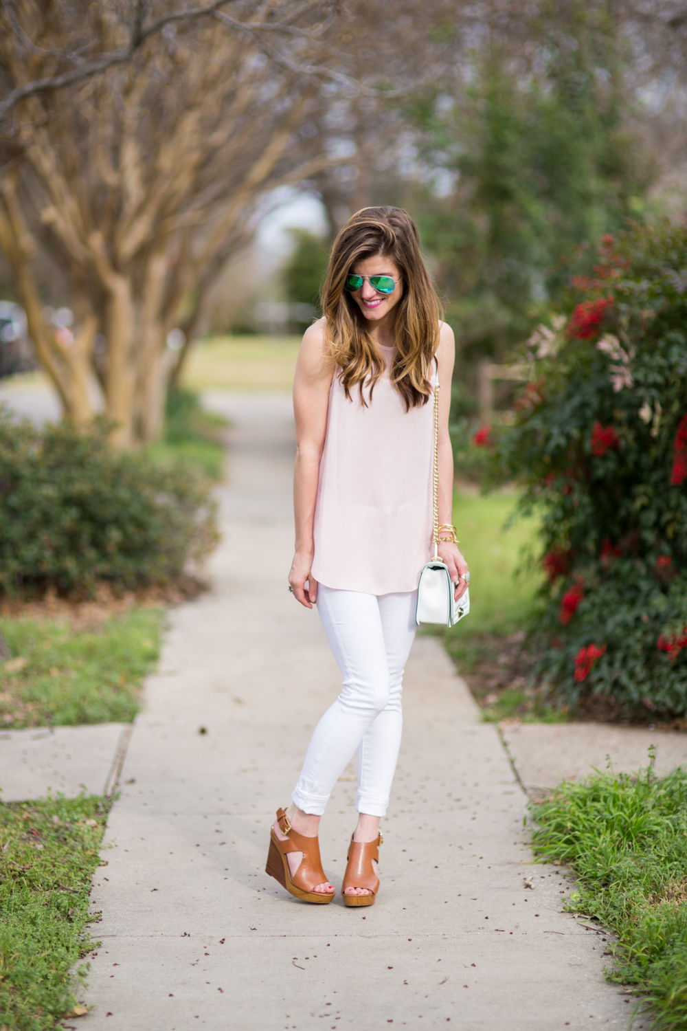white skinny jeans, pastel blush pink shirt, rebecca minkoff love quilted bag, michael kors Josephine wedgtes