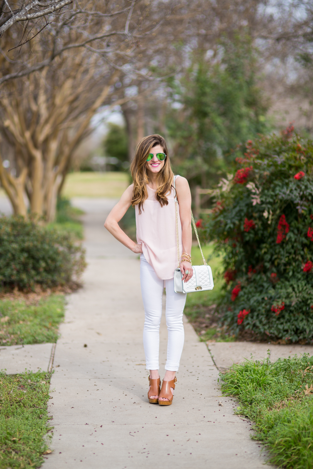 white skinny jeans, pastel blush pink shirt, rebecca minkoff love quilted bag, michael kors Josephine wedgtes