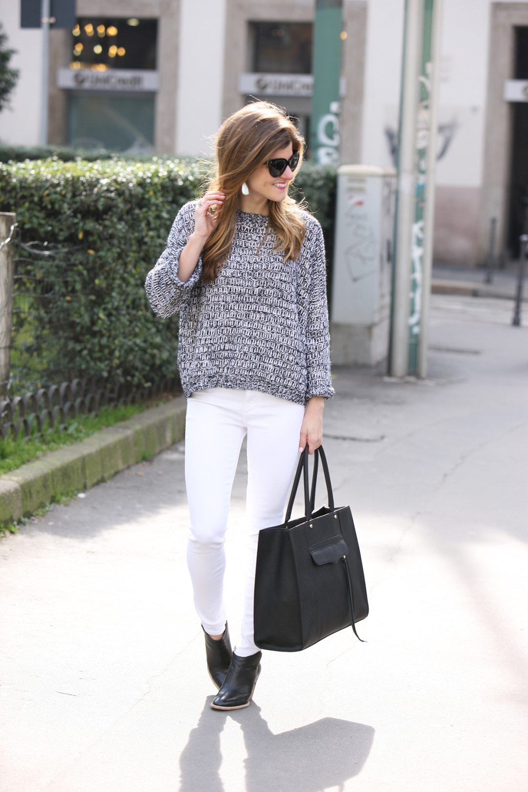 white jeans + black and white marled cropped sweater + black Slip ons + Rebecca Minkoff MAB Tote black bag