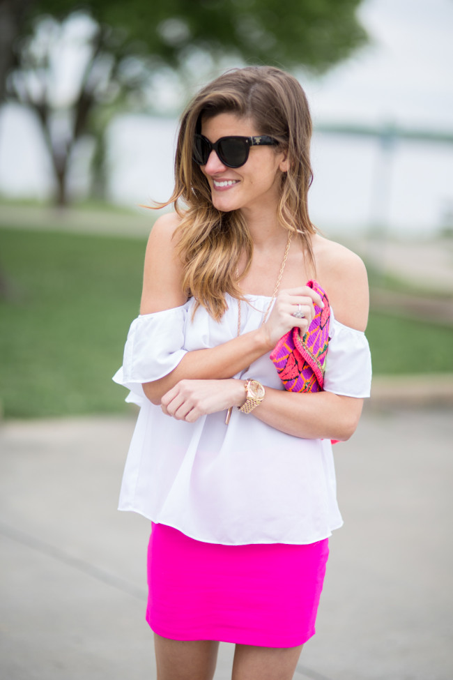 statement clutch and off the shoulder shirt