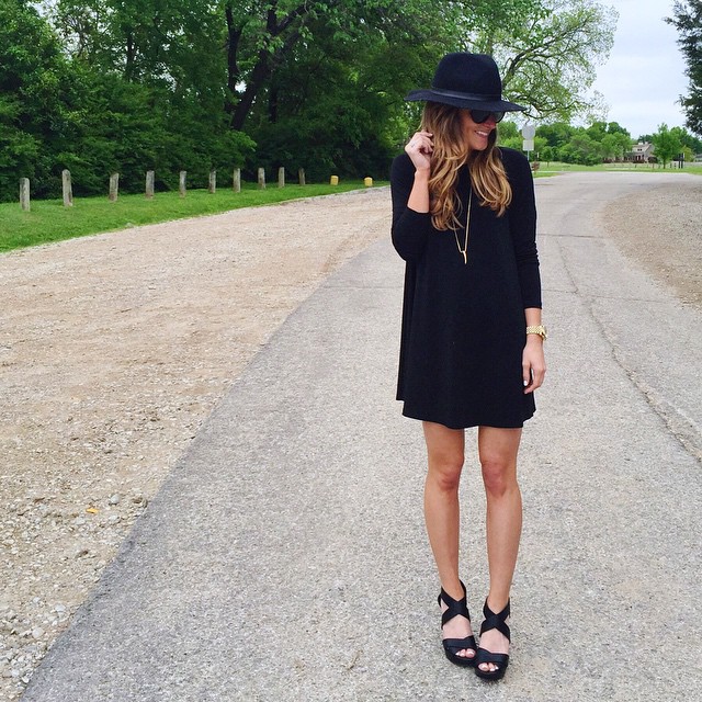 black long sleeve swing dress with long necklace and fedora transitional outfit
