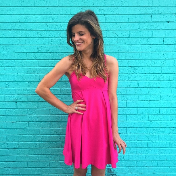 pink dress blue wall