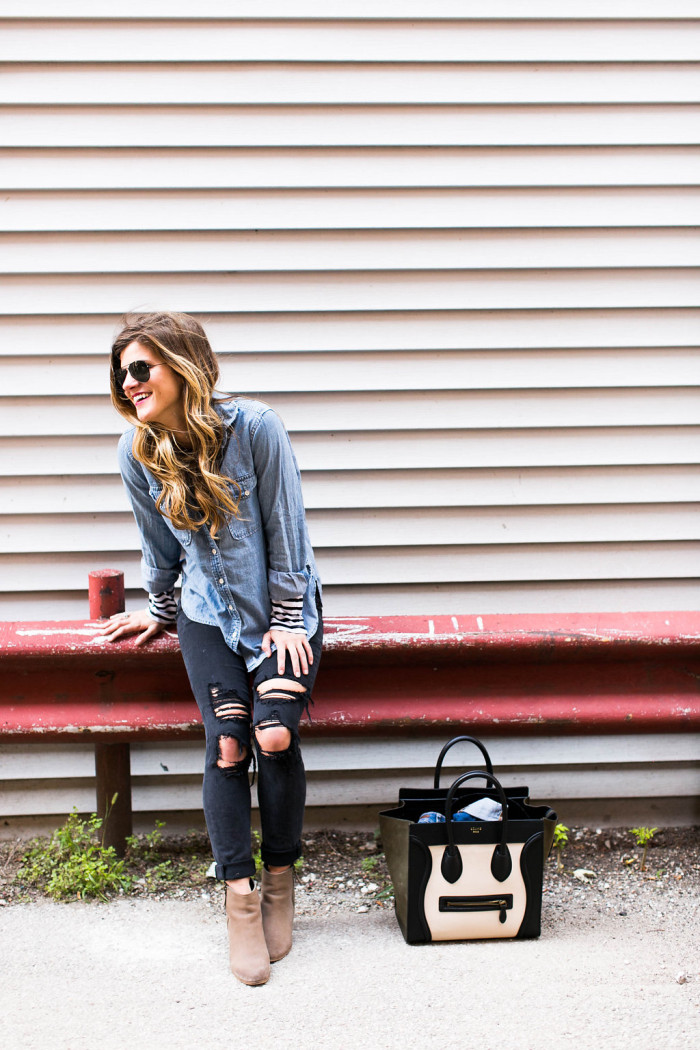 distressed black skinny jeans chambray fall outfit brighton the day blog