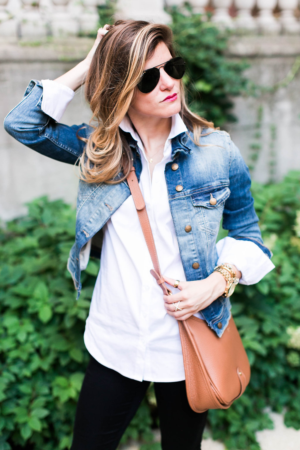 what to wear with a jean jacket, denim jacket and white button down and brown leather crossbody and leopard pointed toe heels