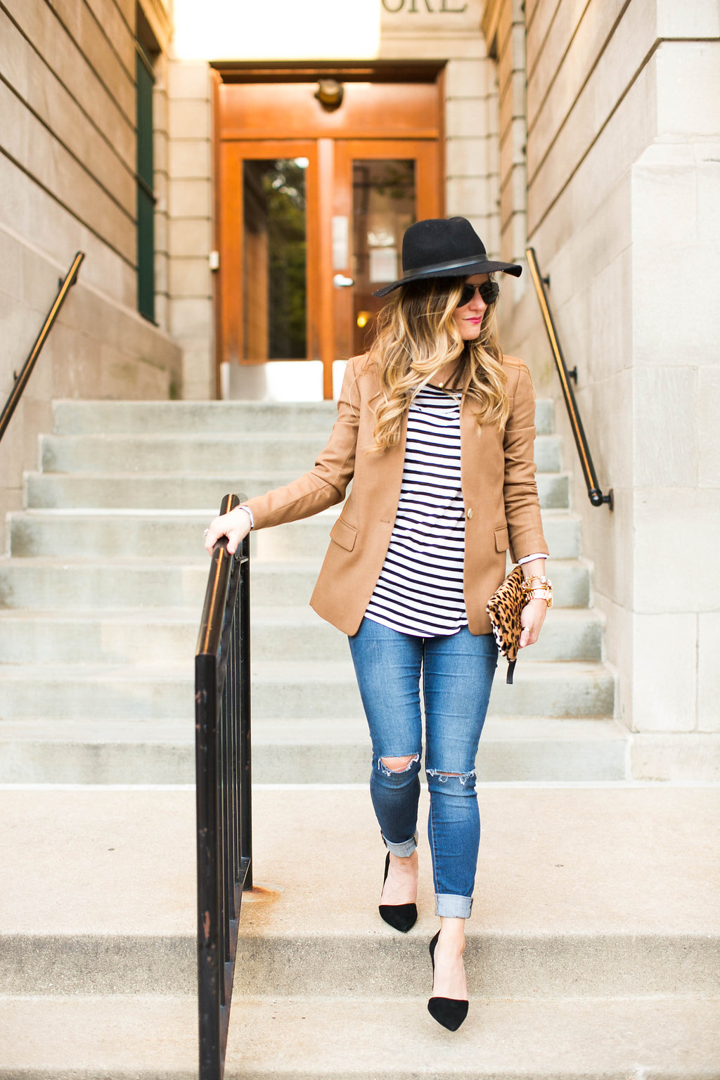 camel blazer and stripe tee and jeans outfit