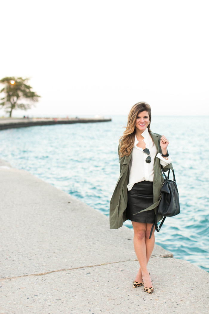 leather mini skirt worn with olive green jacket and leopard heels