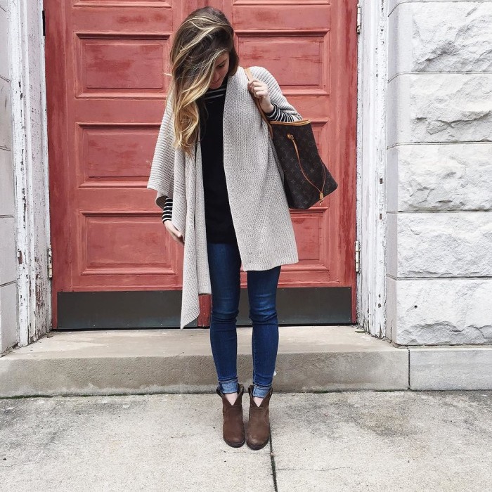 Cream Poncho over black sweater and striped turtleneck