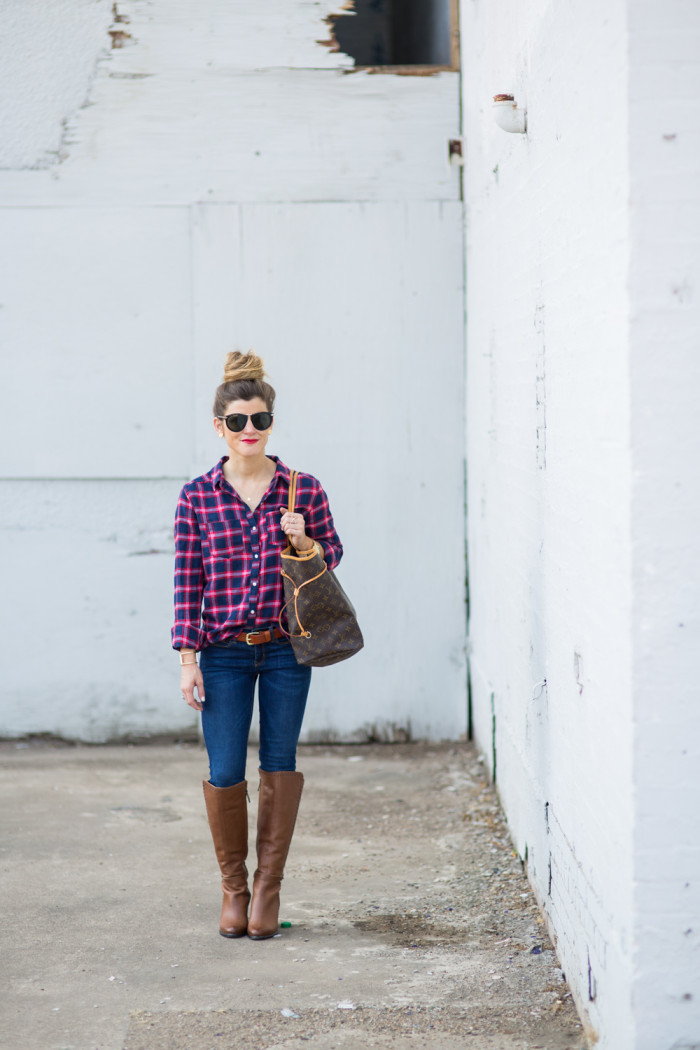 top knot and plaid shirt and tall brown boots