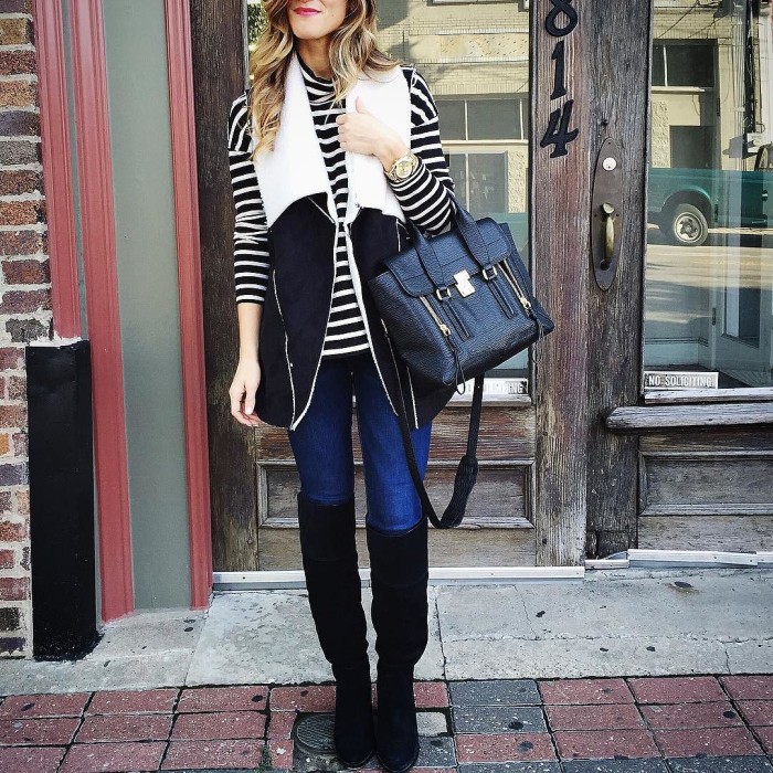 black faux shearling vest with striped turtleneck