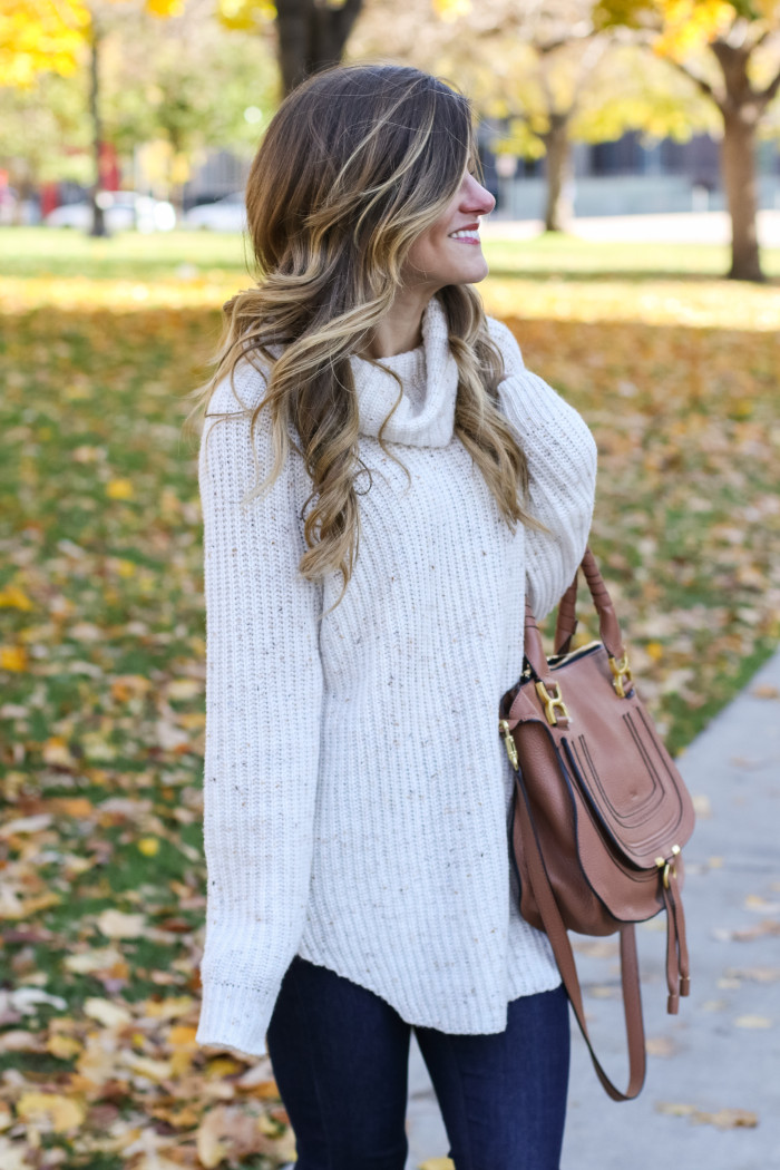 simple neutral outfit with cream turtleneck and cognac suede boots