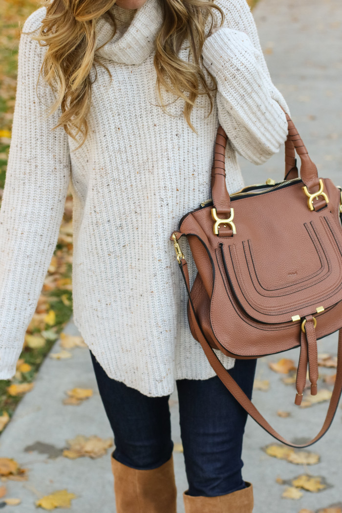 simple neutral outfit with cream turtleneck and cognac suede boots