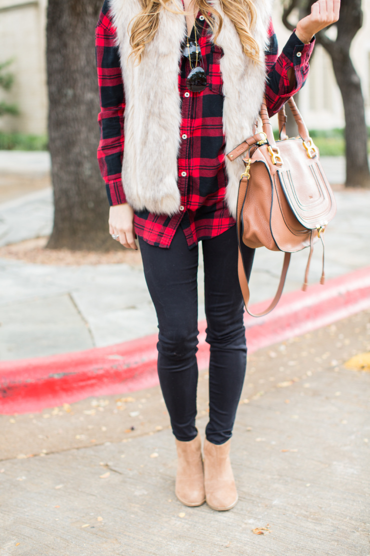 fall outfit ideas: faux fur vest and plaid casual look