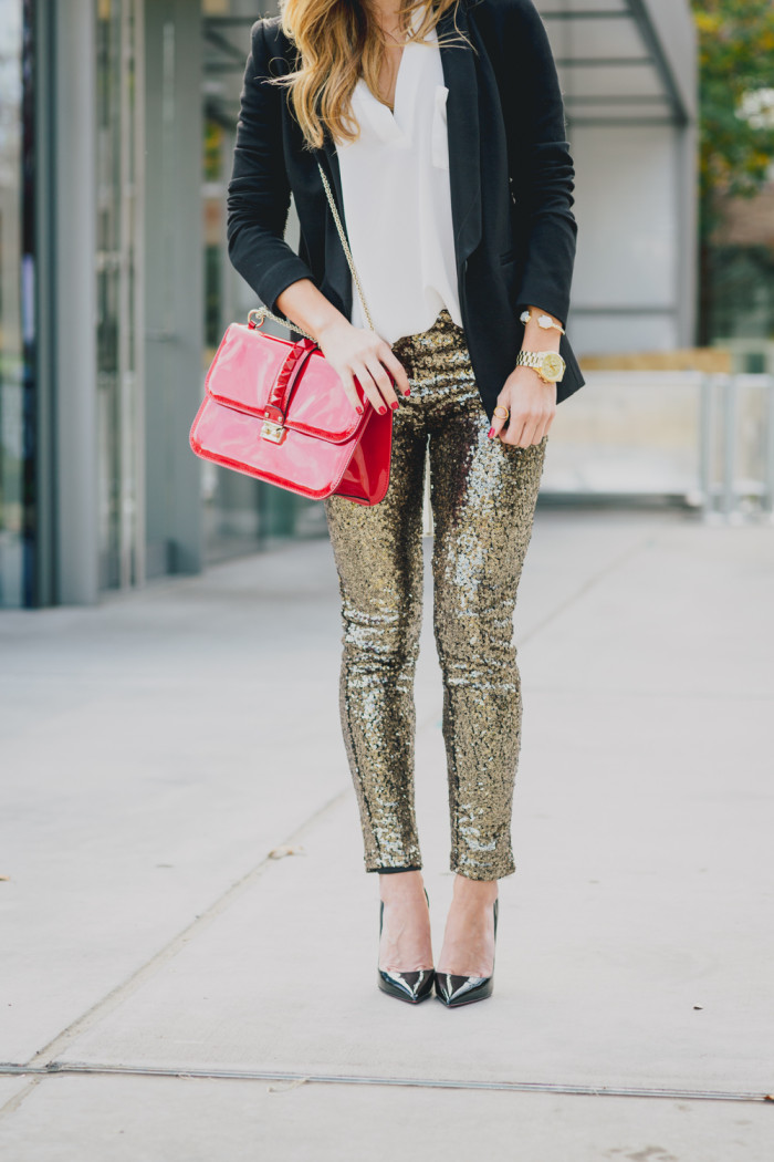 holiday outfit with gold sequin pants, white tunic blouse, black blazer, christian louboutin SO KATE heels