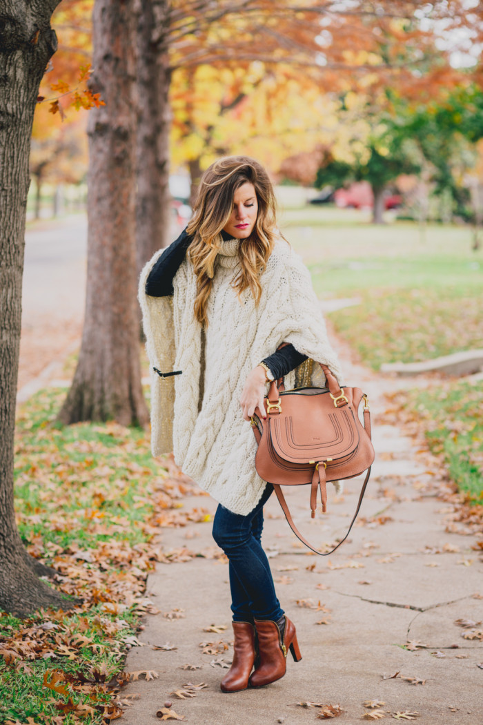 cable knit poncho, jeans, cognac booties, chloe small marcie bag