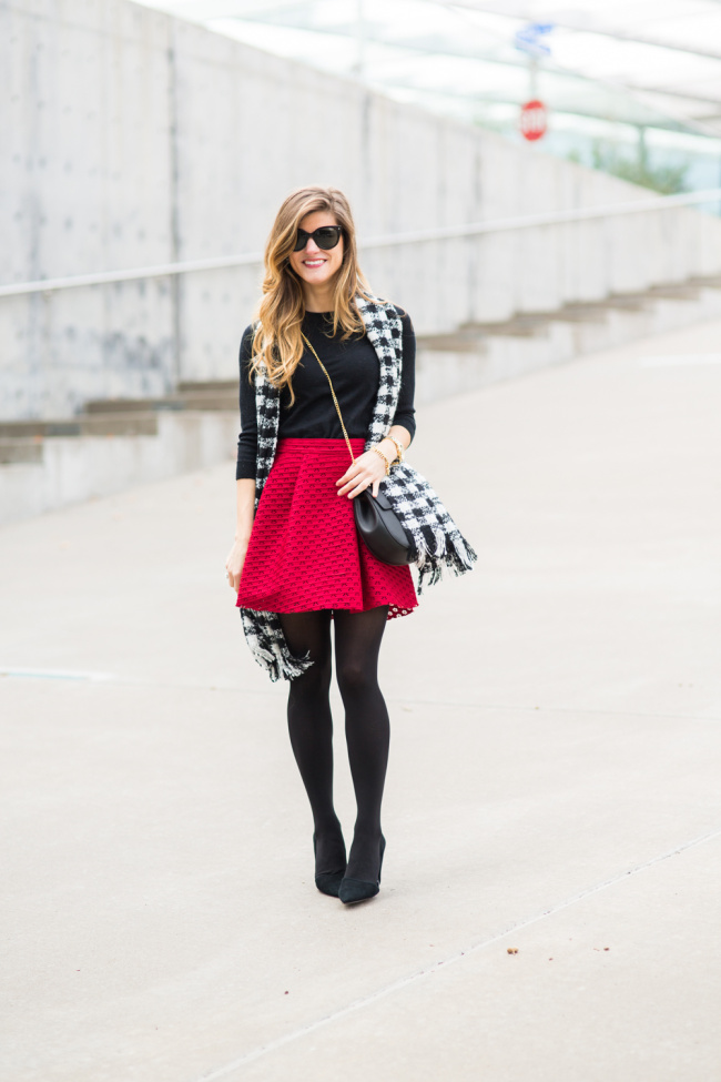 red skater skirt, black drew chloe bag, black tights winter date night outfit