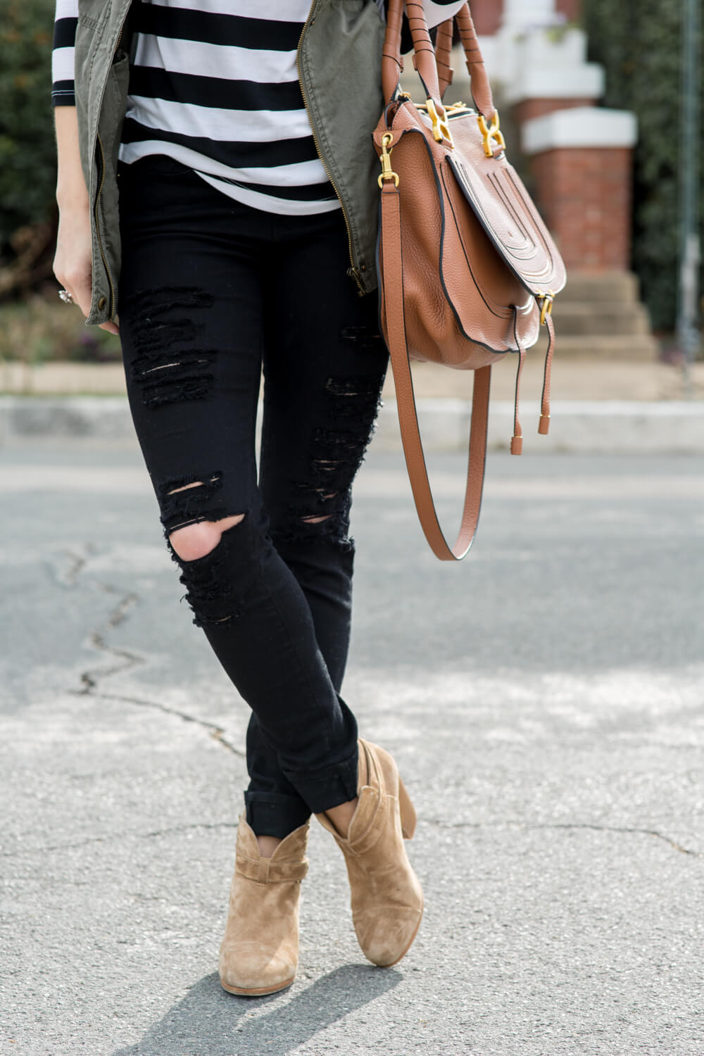 distressed black jeans + brown booties