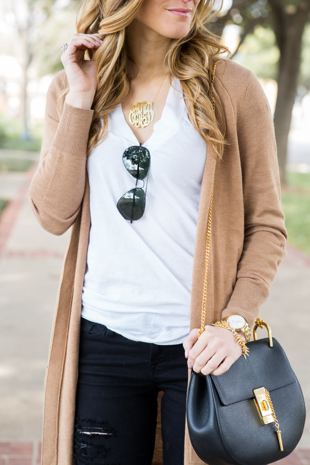 long camel cardigan, black distressed jeans, white t-shirt, black floppy hat, leopard heels, how to wear leopard outfit, dressed up white t-shirt outfit, trendy fall outfit, black chloe bag. fall gold accessories