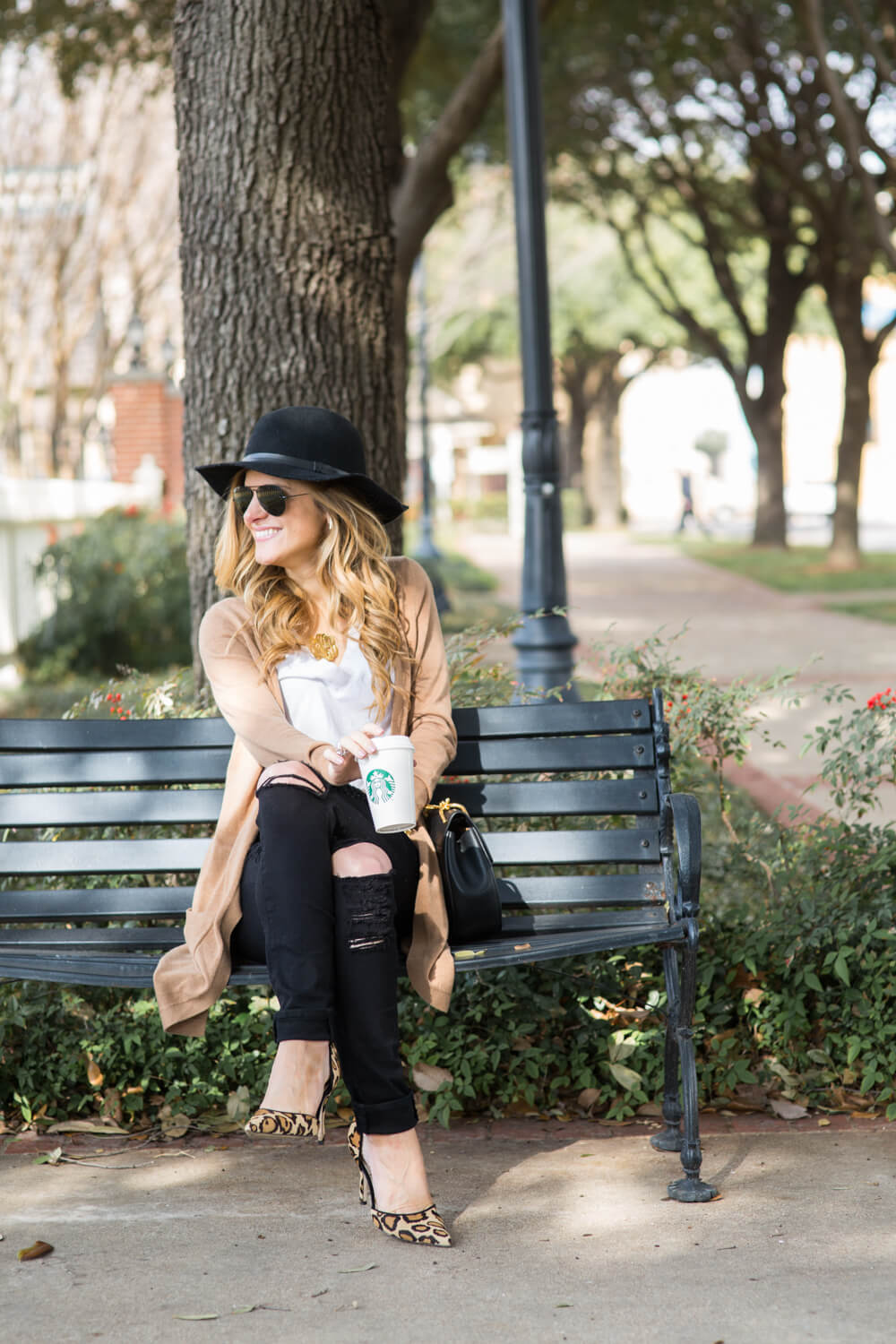 long camel cardigan, white tee, black ripped jeans, aviators, black chloe drew bag, black floppy hat, leopard heels, dressy black jeans outfit, transitional fall outfit, dressing up a white t-shirt, fall starbucks