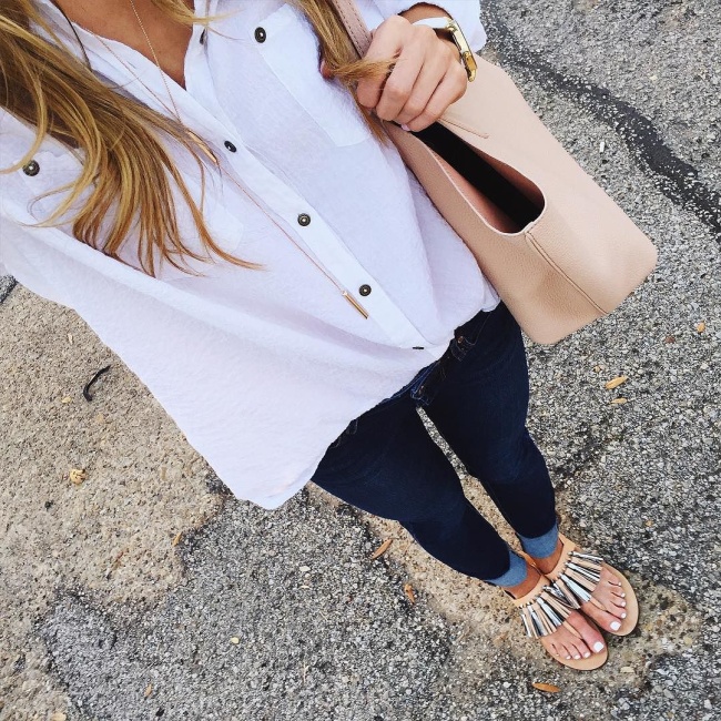 @brightonkeller instagram ootd selfie wearing oversized white blouse tucked into dark denim and fringe rebecca minkoff sandals
