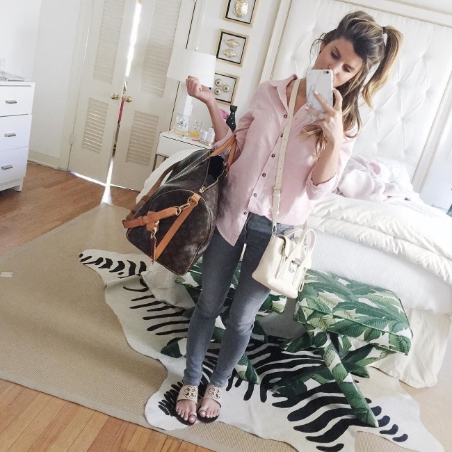 @brightonkeller mirror selfie wearing grey jeans, pink button up blouse and tory burch flats