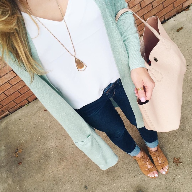 brighton the day selfie of green long cardigan layered over a white camisole with kendra scott pendant necklace and tory tote 