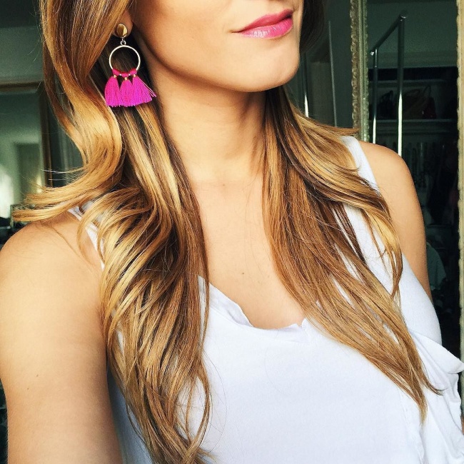 @brightonkellerhot pink tassel earrings with pink ysl lip stain