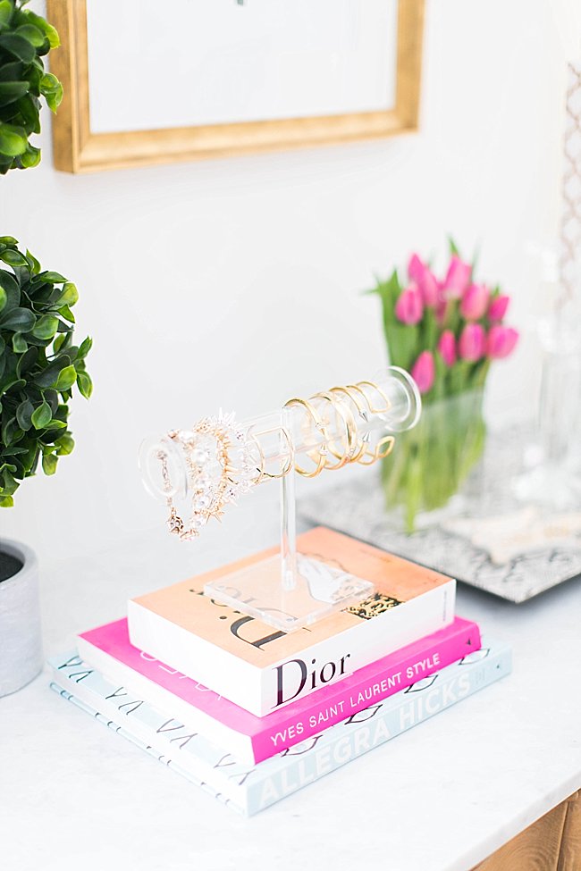 brighton keller bedroom shoot acrylic bracelet holder detail over fashion coffee table books