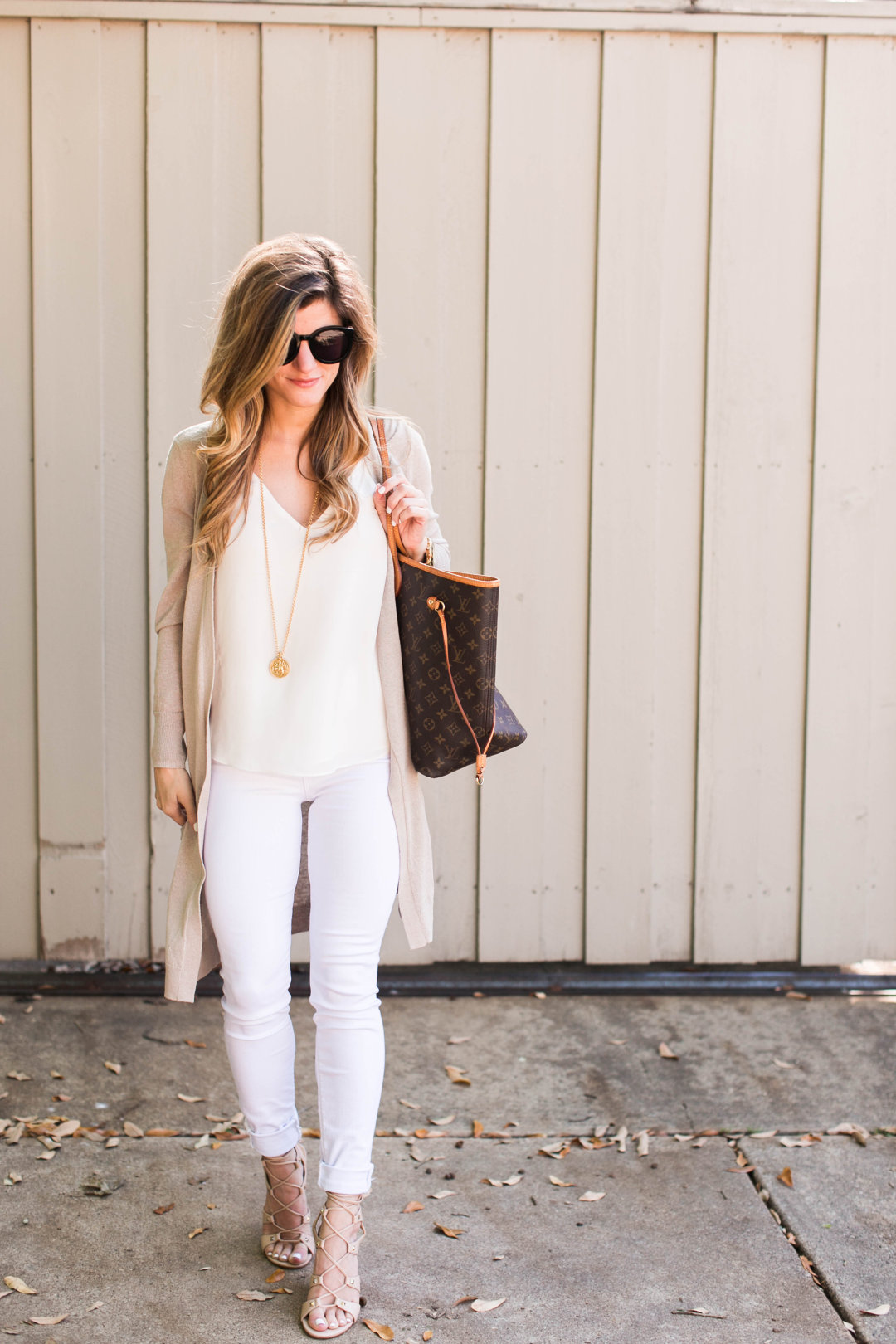 white jeans outfit, white tank, long cream cardigan, julie vos gold pendant, lv neverfull tote 21, ivanka trump lace up sandals, spring neutrals outfit, transitional outfit