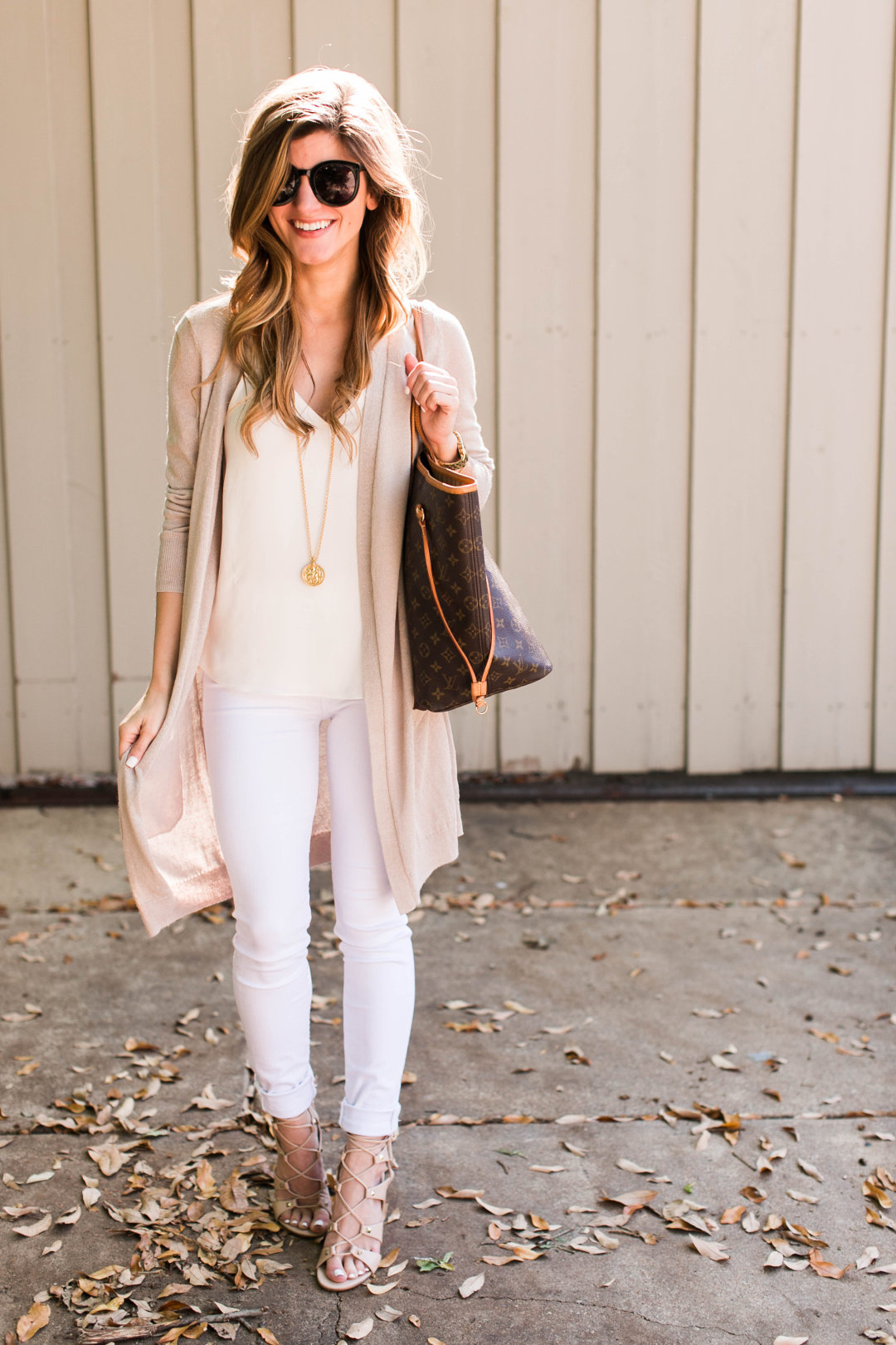 white jeans outfit, white tank, long cream cardigan, julie vos gold pendant, lv neverfull tote 21, ivanka trump lace up sandals, spring neutrals outfit, transitional outfit