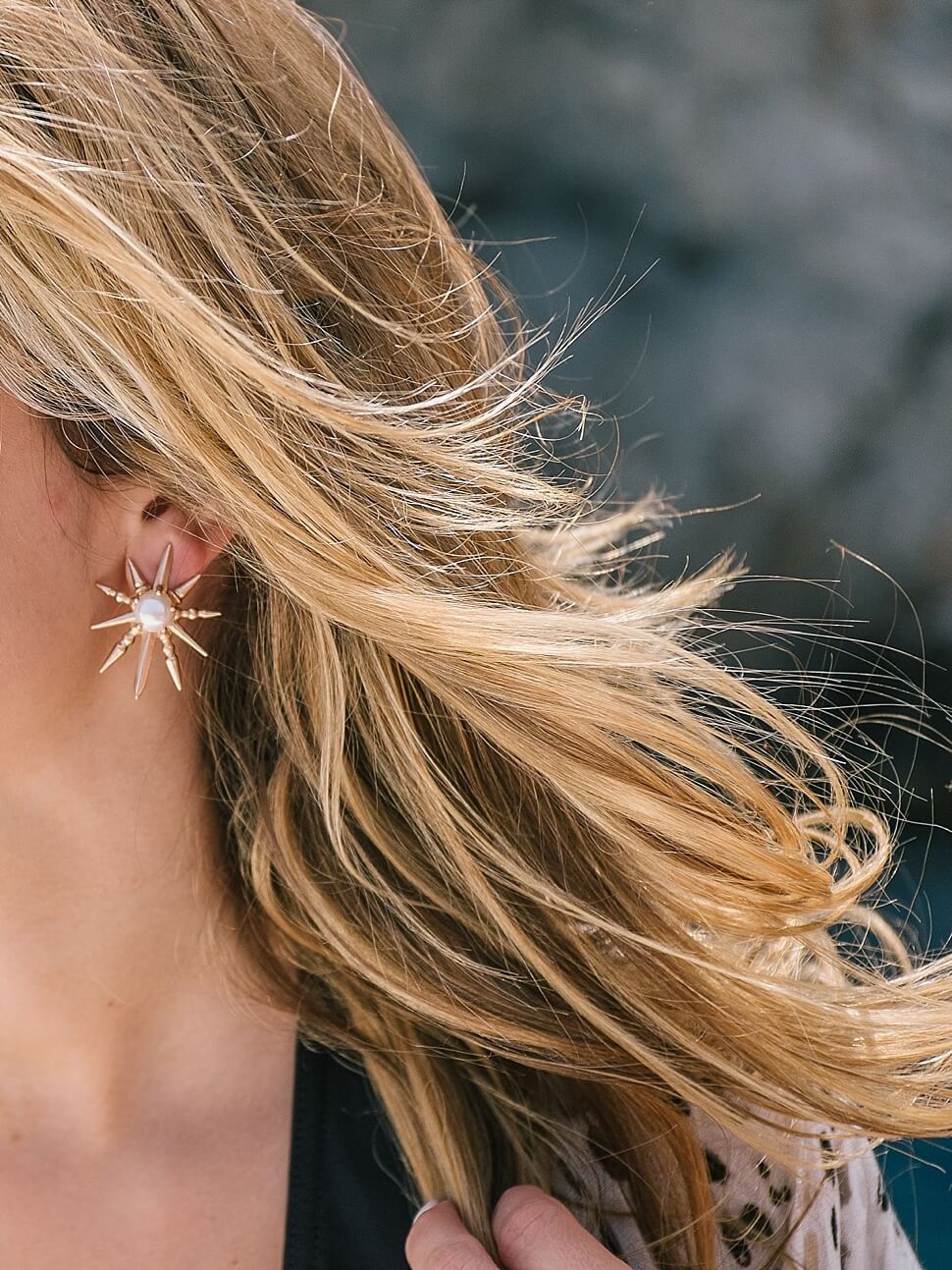 detail shot of kendra scott star stud earrings