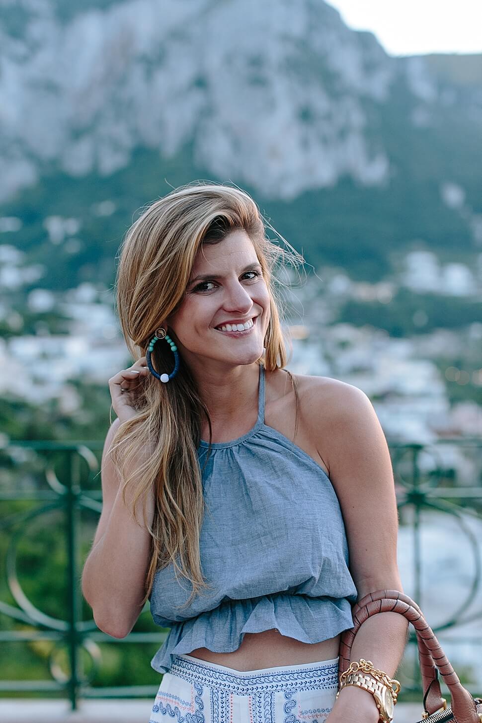 brightontheday wearing baublebar statement earrings and clalyton chambray top in capri italy