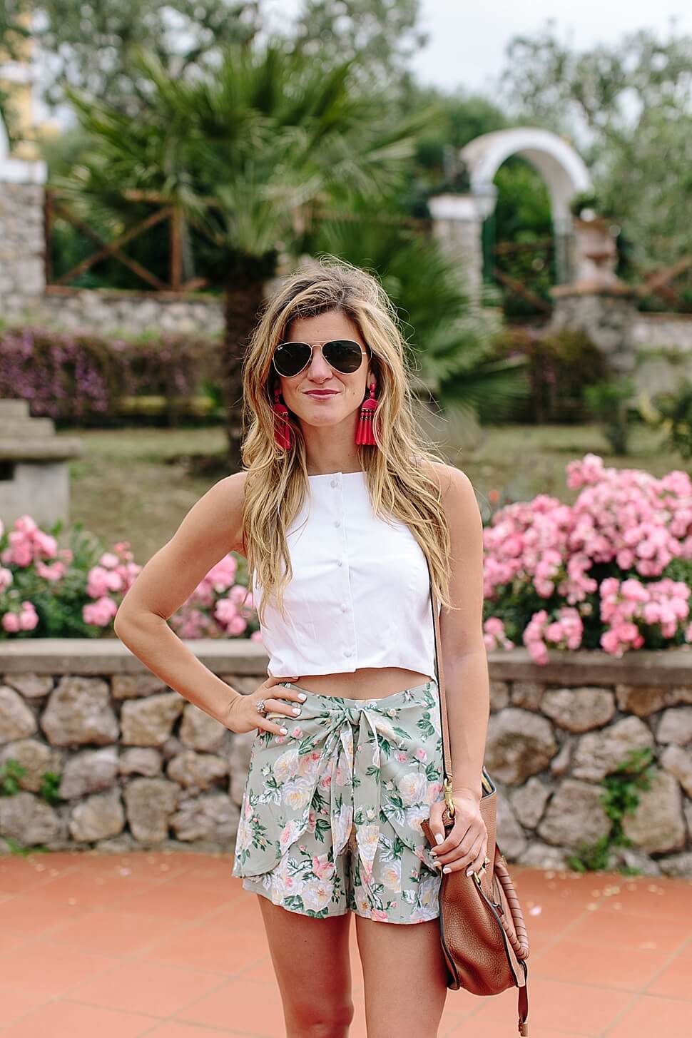 high-waisted floral shorts and baublebar statemet earrings 8