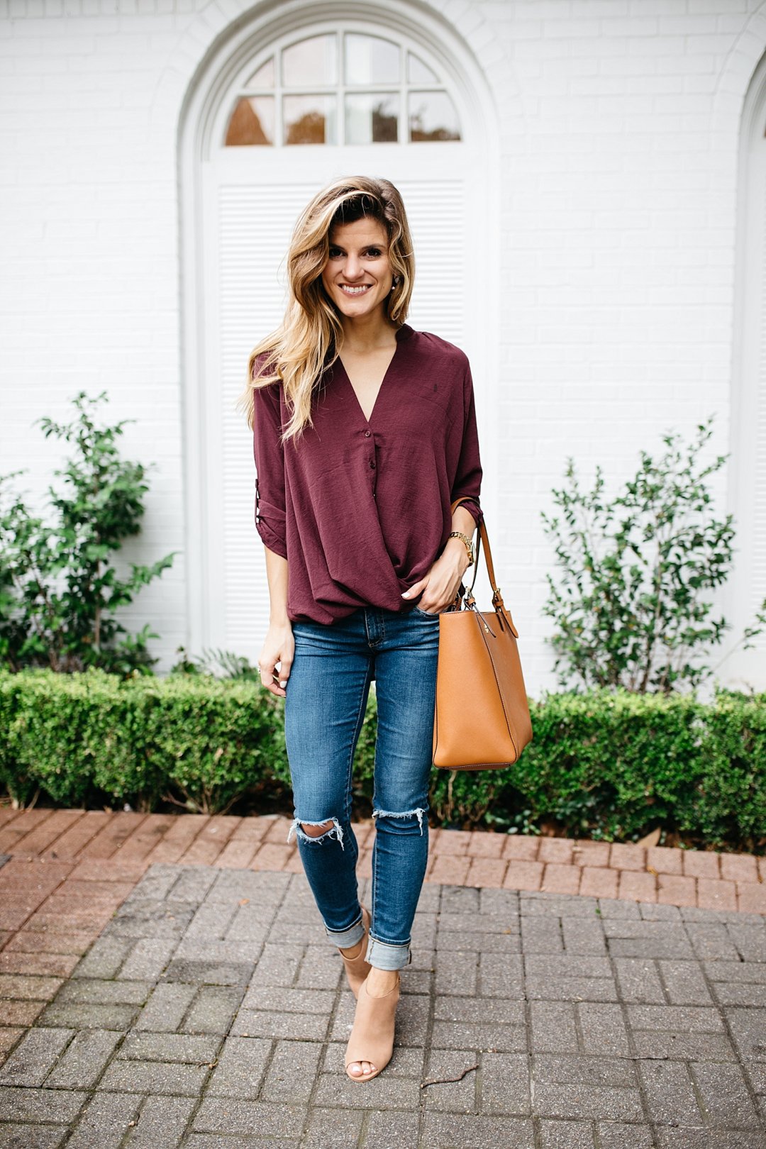 fall transitional outfit with burgundy blouse and peep toe booties