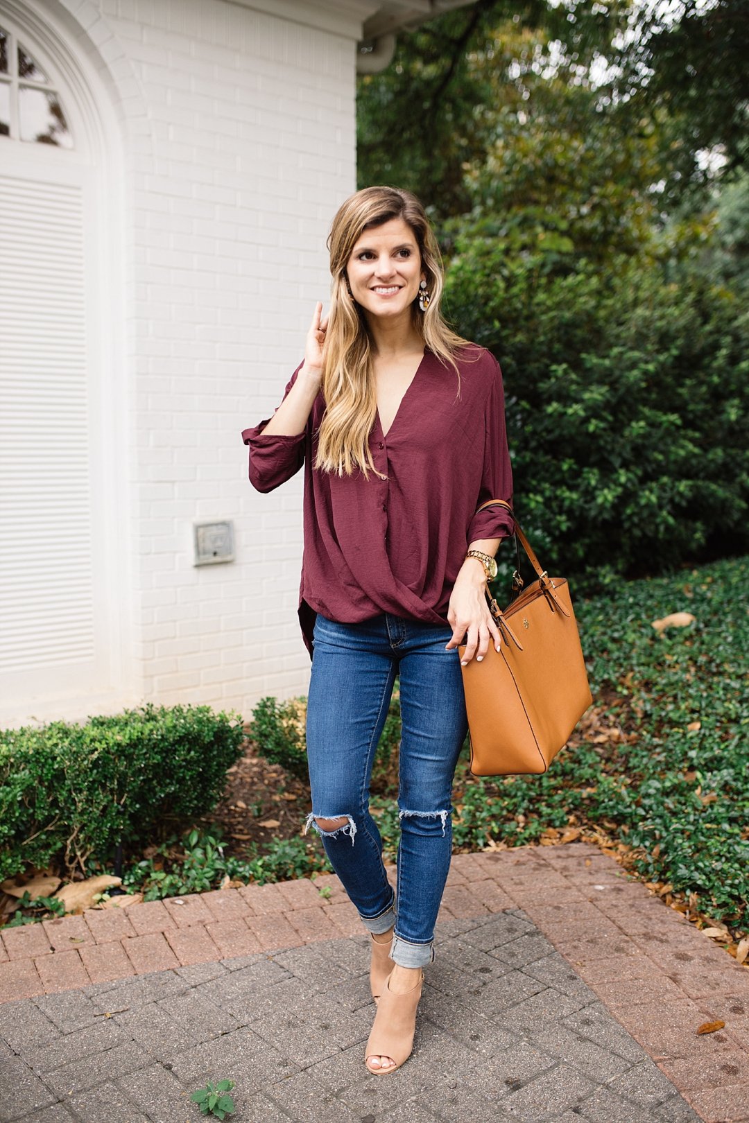 brighton the day styling twist front blouse with distressed jeans and peep toe booties 