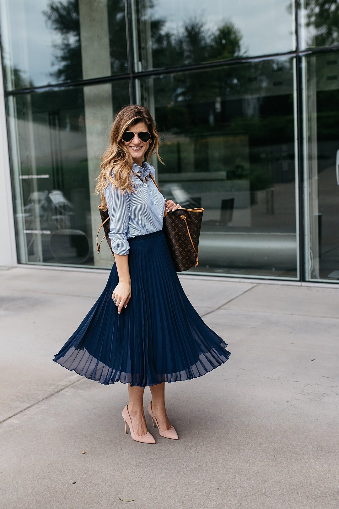 business casual outfit idea, incorporating trends at work, how to be stylish at the office, pleated midi skirt outfit, navy and blush pink outfit, business professional outfit idea, spring work wear outfit