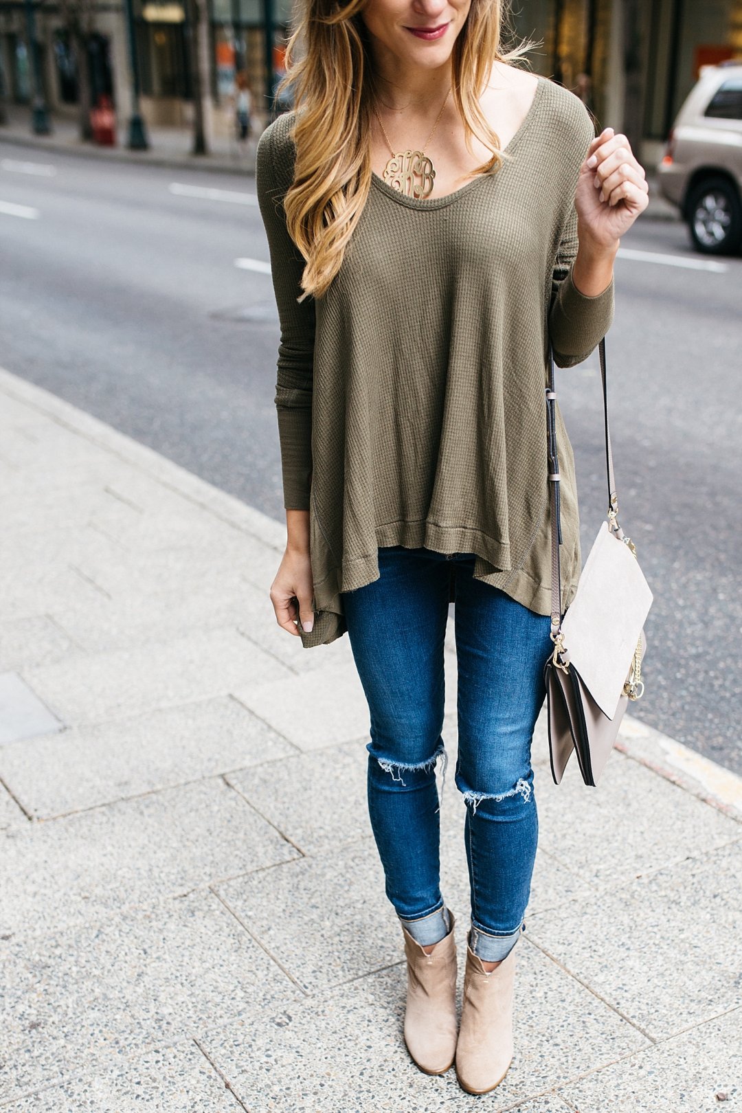 chloe fay handbag, olive green free people waffle tee, blue jeans, vince camuto booties, fall outfit details, AG legging jeans