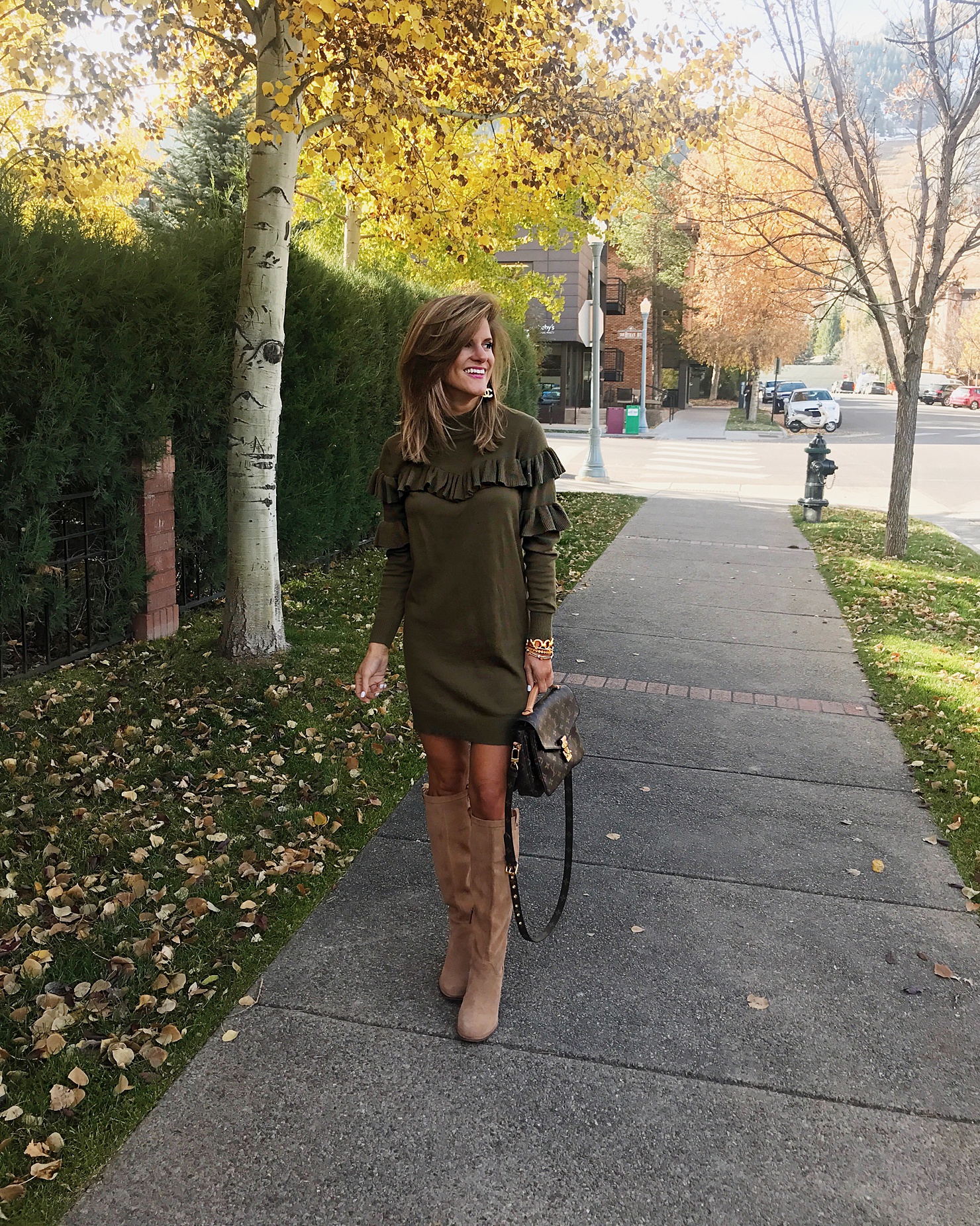 olive green ruffle sweater dress with suede tall boots // fall outfit ideas // transitional fall outfit 