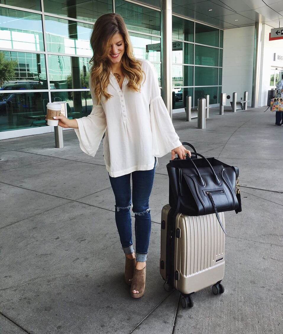 brighton the day travel outfit with white bell sleeve top 