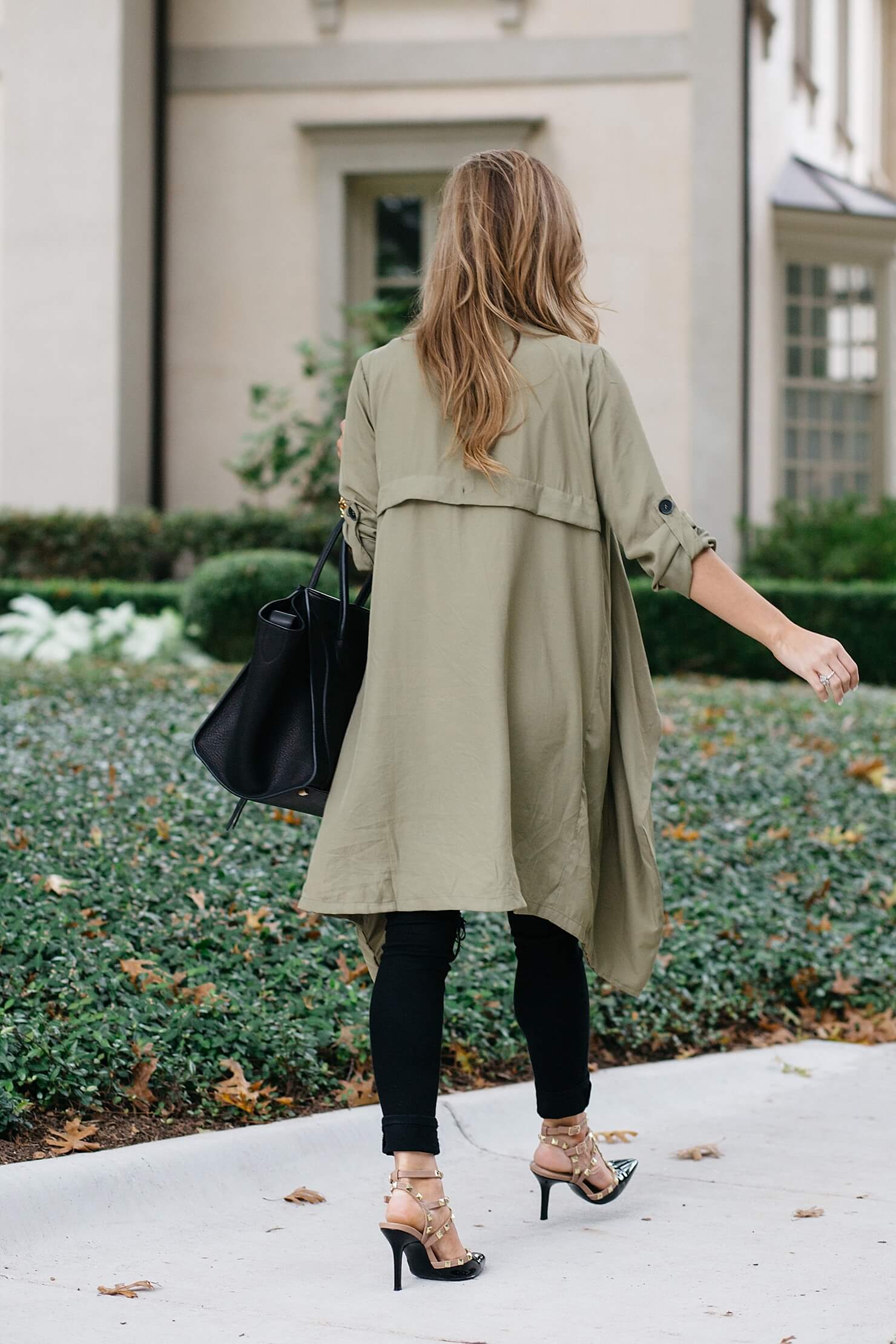 olive green trench outfit, snappy casual outfit with dupe valentino heels, monogram necklace, celine phantom tote, topshop white camisole, black distressed jeans, fall outfit