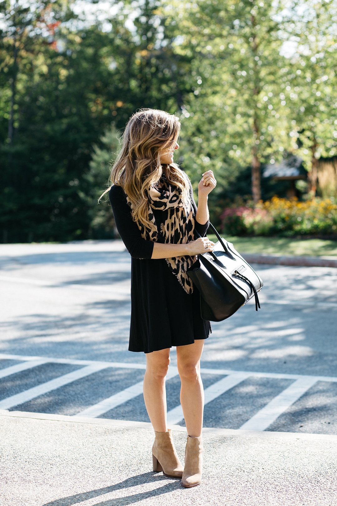 black swing dress with boots, leopard scarf, dress with ankle booties, black dress with leopard print scarf, celine phantom tote, pointed toe suede booties and swing dress outfit, pre-fall transitional outfit