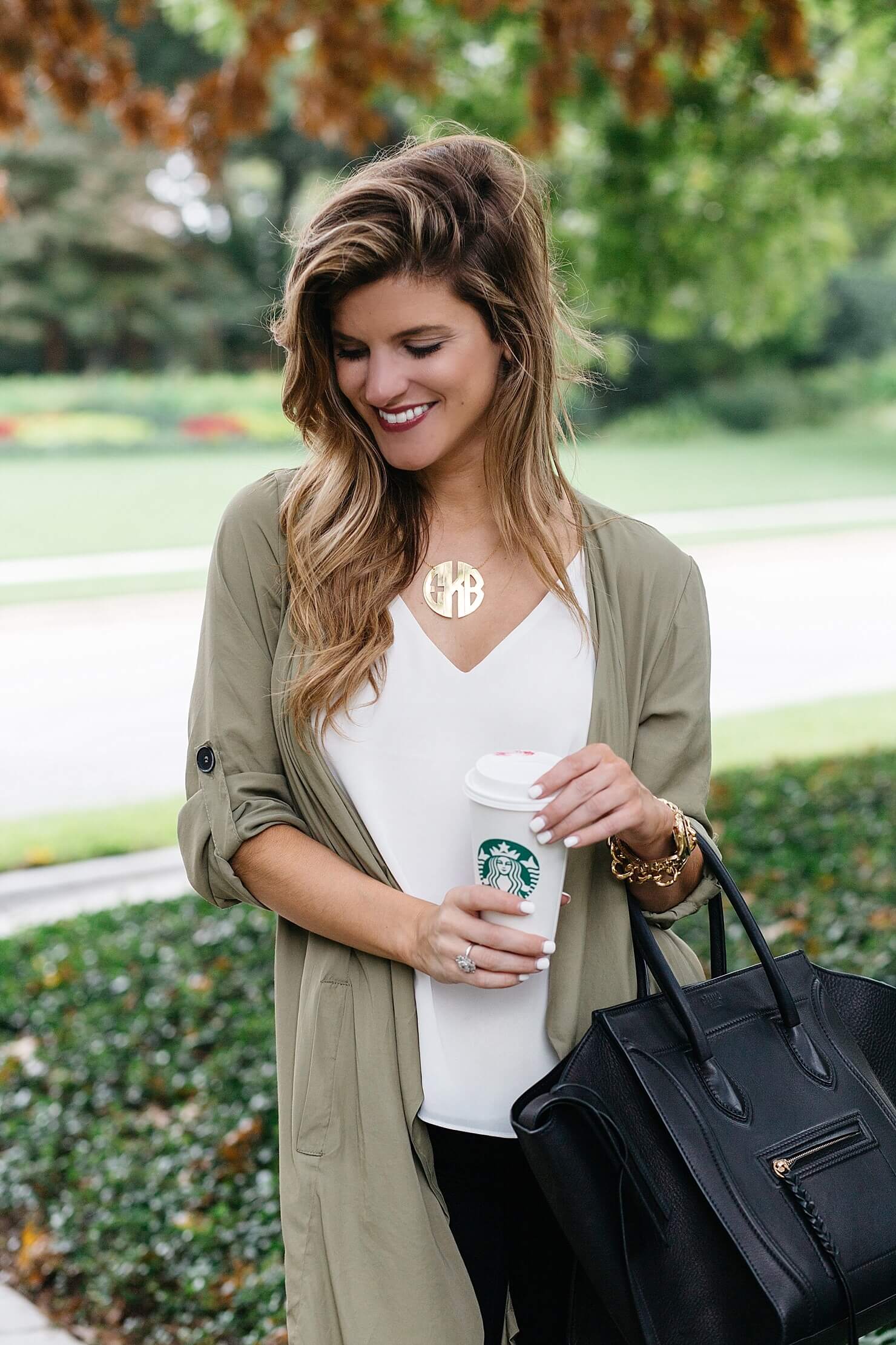 moon and lola gold monogram necklace, olive green trench, outfit details, black celine phantom tote
