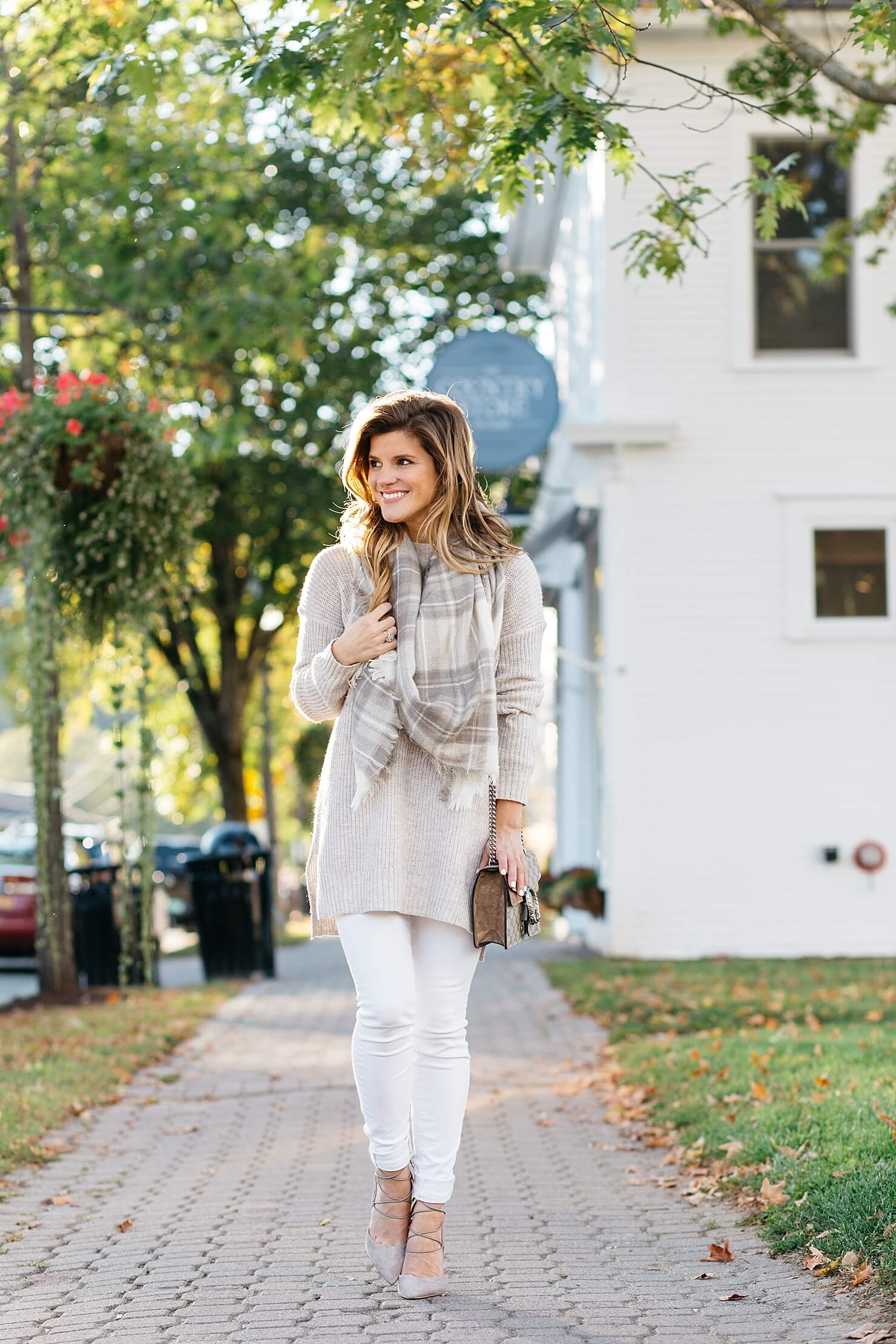 oatmeal neutral tunic sweater, sam edelman lace up heels, gucci crossbody, plaid scarf, neutral fall white jeans outfit